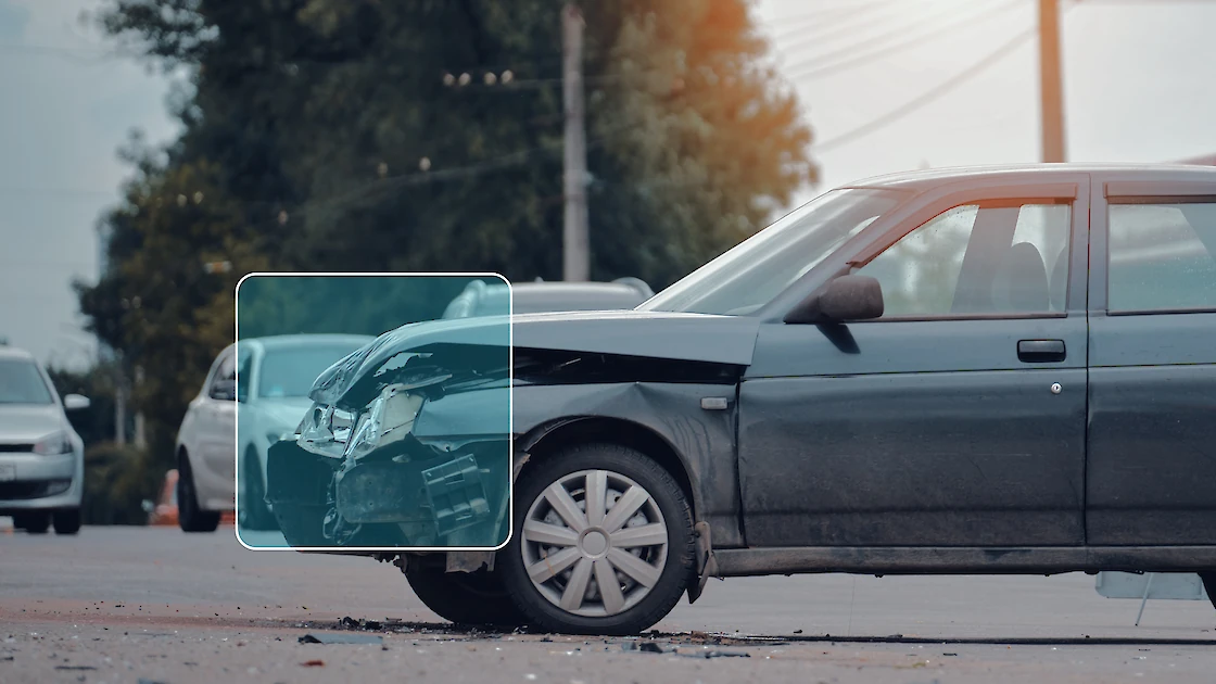 A car accident in a street intersection detected by nearby AI.